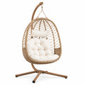 Poltrona sospesa autoportante in acciaio e rattan sintetico beige, 105 × 105 × 195 cm